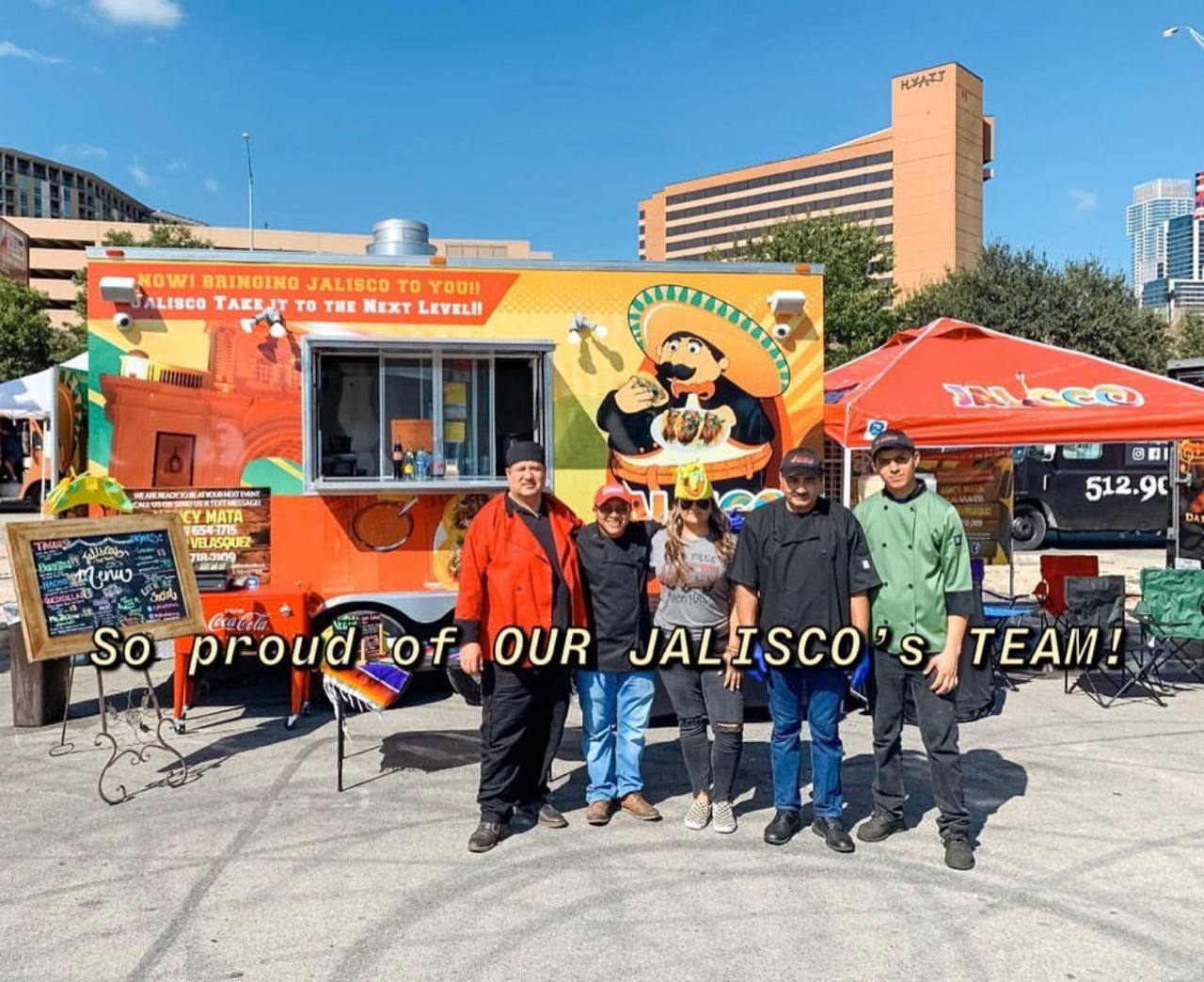 The full Jalisco Food Truck team proudly standing in front of the truck