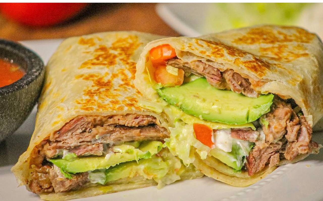 Grilled carne asada burrito with avocado and pico at Jalisco Food Truck Bastrop TX