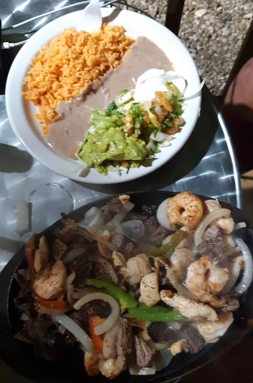 Mixed fajita skillet with shrimp chicken and steak at Jalisco Food Truck Bastrop TX