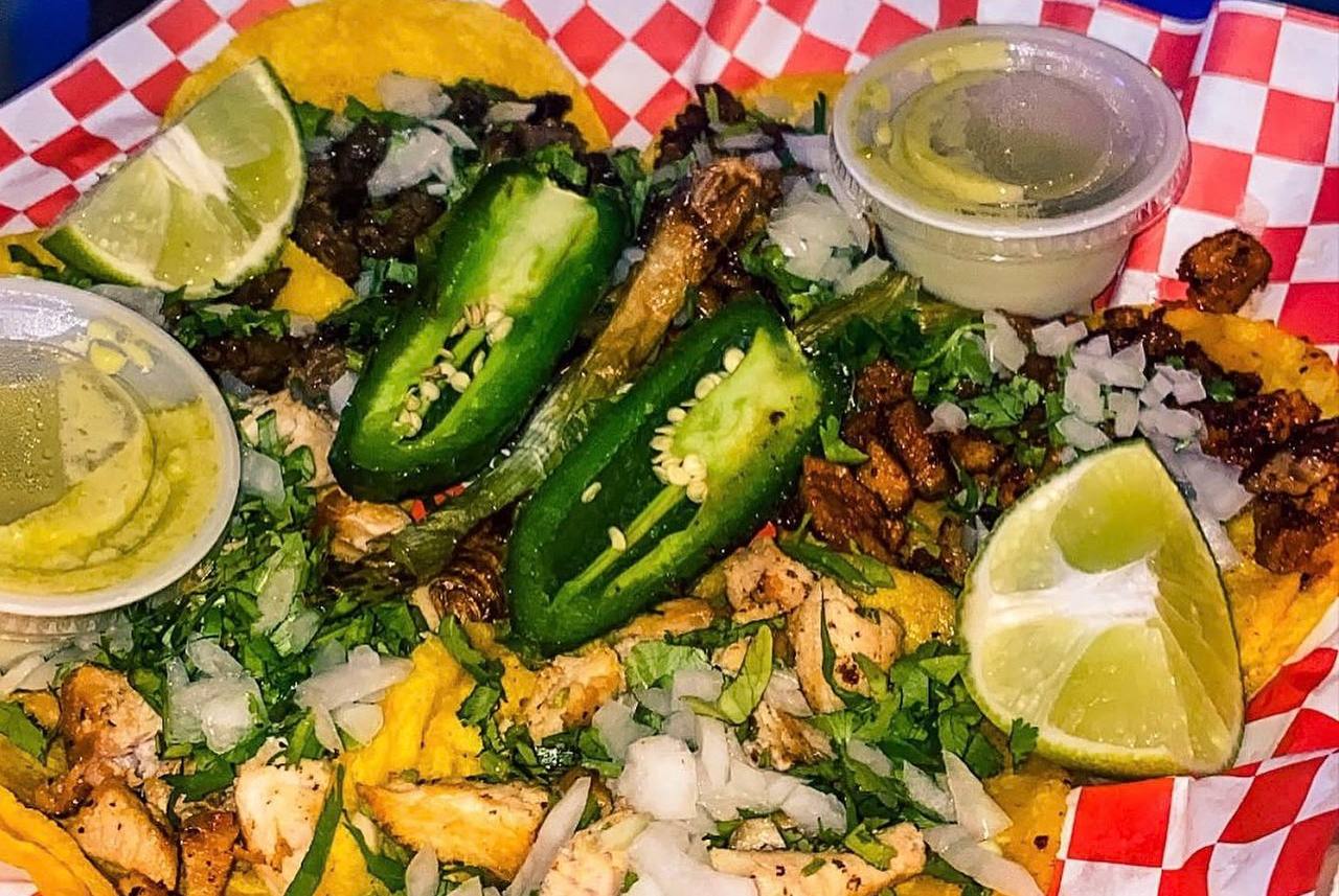 Mixed taco platter with jalapenos lime and salsa at Jalisco Food Truck Bastrop TX