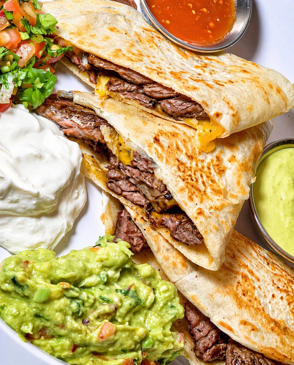 Steak quesadilla with guacamole and sour cream at Jalisco Food Truck Bastrop TX